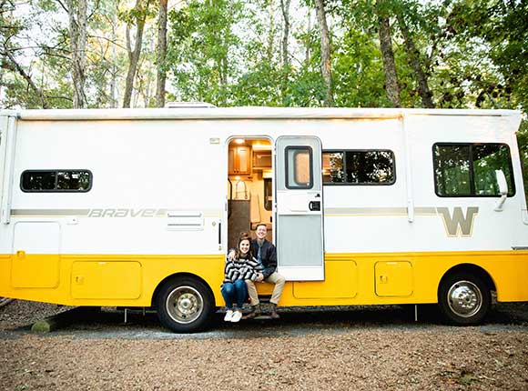 Couple in Motorhome Being Leveled with SnapPad XTRA